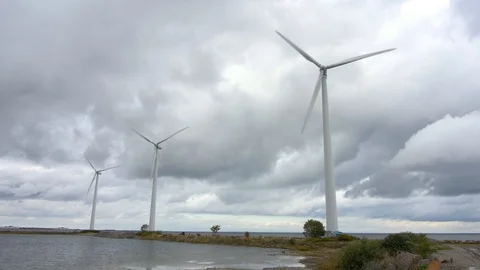 Three windmills slow motion Stock Footage 117178647