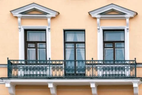 Three Windows with balcony. Stock Photos