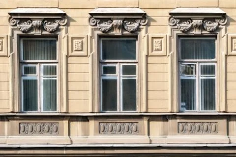 Three Windows with bas-relief. Stock Photos