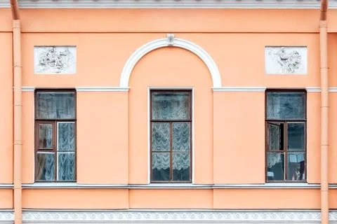 Three windows on the pink. Stock Photos