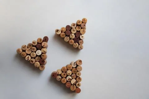 Three wine corks triangles in triangular shape 写真素材