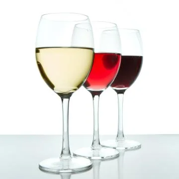 Three wine glasses Stock Photos