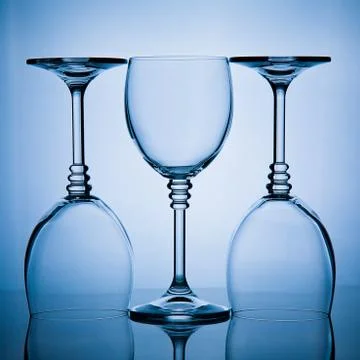 Three wineglasses in a row Stock Photos