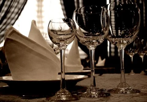 Three winy glasses on a table Stock Photos