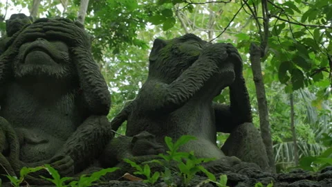 Three wise monkeys Asian stone statue Stock Footage 133026746