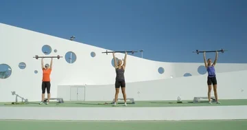 Three women doing an Aerobics class using weights. 스톡 동영상 86124181