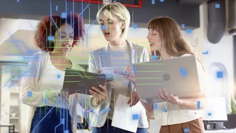 Three women tapping tablet in tech hub, reviewing data, circuit graphics rising Stock Footage 333510113