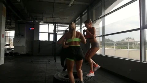 Three women train in the gym Stock Footage 80989758