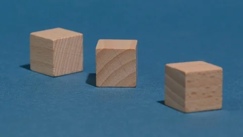 Three wooden cubes Stock Footage 118363975