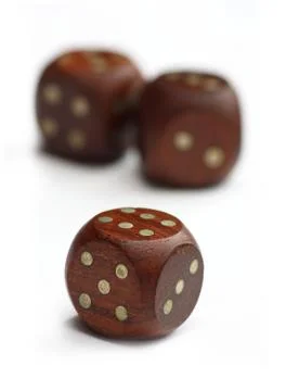 Three wooden dice Stock Photos