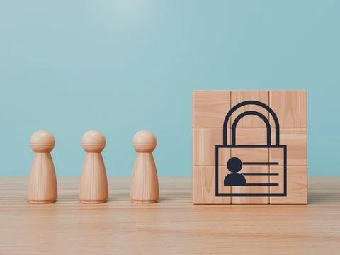 Three wooden figurines standing next to a stack of blocks with a privacy 스톡 일러스트