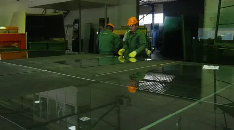 Three Workers Are Carefully Taking Out The Cut Sheets From the Table, Workers Stock Footage 52875611