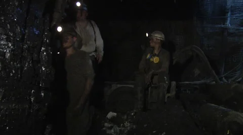 Three Workers Are Standing Miners are Turning Heads Men is Safety Helmets And Stock Footage 53504492