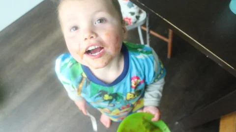 Three Year Old Boy with Empty Plate Stock Footage 107878766