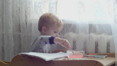 Three years old caucasian Boy Drawing with Felt-tip pen. Little Boy Having Fun Stock Footage 172412257