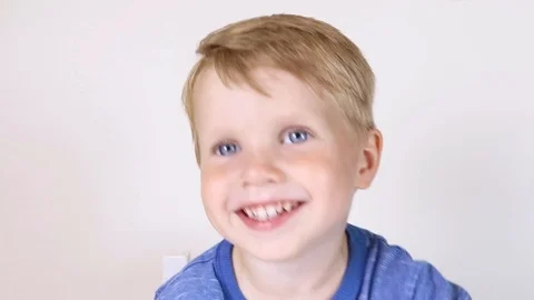 Three years old kid and emotions, close-up portrait of happy smiling kid Stock Footage 93444865