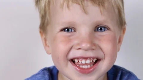 Three years old kid and emotions, close-up portrait of happy smiling kid Stock Footage 93446019