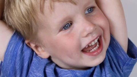 Three years old kid and emotions, close-up portrait of happy smiling kid Stock Footage 93446249