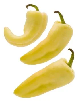 Three yellow peppers Stock Photos