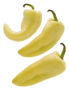 Three yellow peppers Stock Photos
