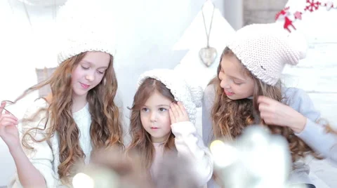 Three young beautiful girls in winter hat Video stock 59139609