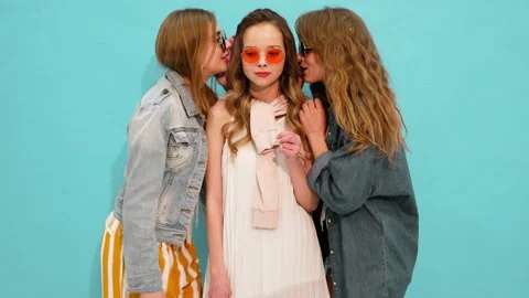 Three young beautiful smiling hipster girls Stock-Footage 140791239