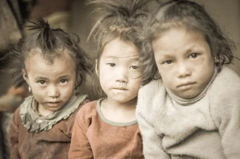 Three young faces in Nepal Stock Photos
