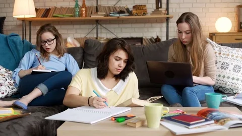 Three young female student study together being serious and concentrated Video stock 75963540