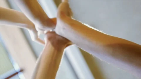 Three young friends congratulate each other slapping hands Stock Footage 54938176