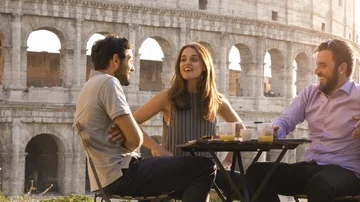 Three young friends having fun laughing telling stories and jokes with Stock Footage 85815414