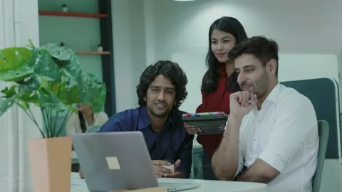 Three young indian people two men and one woman Attractive talking on a video. Видео 163403321
