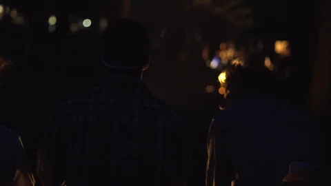 Three Young Men Sitting Talking Around Campfire in Yosemite. Stock Footage 129457773