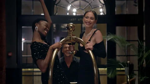 Three Young People Having Fun In Hotel. Man Rides Two Girls. Vidéo 161123909