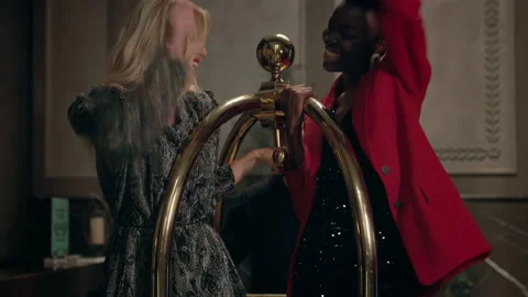 Three Young People Having Fun In Hotel. Man Rides Two Girls. Video stock 161273804