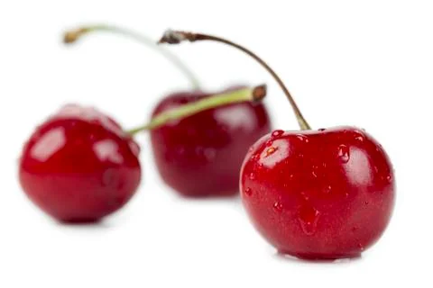 Three yummy cherries Stock Photos