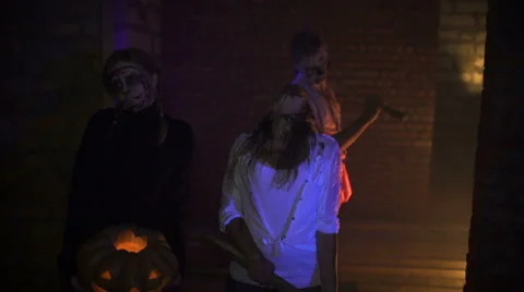 Three zombies stand and stare Stock Footage 68693474