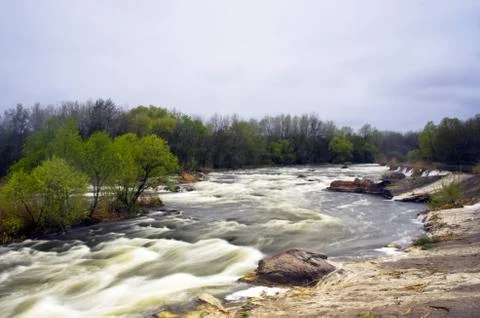 Threshold of the mountain river and wet stones Stock Photos