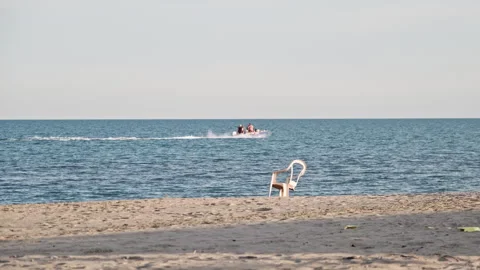 On the Threshold of the Sea: The Spring Ballet of the Speedboat Stock Footage 272336189