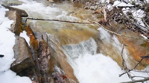 On the threshold of a small mountain stream Stock Footage 50764632