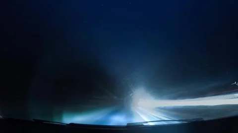 Thrilling night drive at high speed on a UK motorway through dark landscapes and Stock Footage 296853461