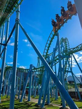 Thrilling roller coaster in park Stock Photos