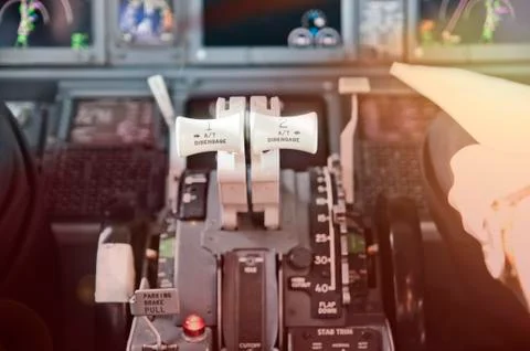 Throttle levers, ready to go. Jet airliner cockpit. Stock Photos