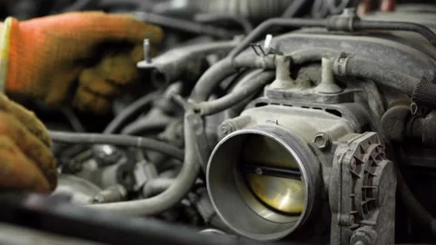 Throttle valve. car engine repair. auto repair shop. close-up Stock Footage 204877308