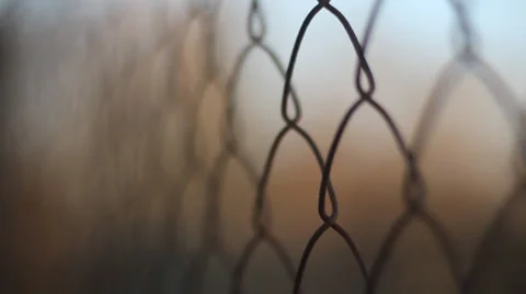 Through the Barbed Wire: An Eerie Perspective Stock Footage 35422006