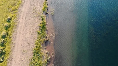 Through the clear water you can see the bottom of the reservoir. Stock Footage 106926600