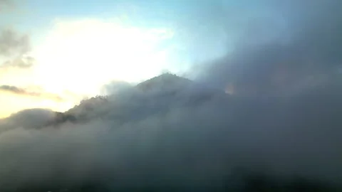 Through clouds moutain Drone reveal Stock Footage 279913060