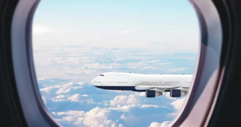 Through a Commercial Airplane Window, Another Aircraft Passes in the Calm Sky. Stock Footage 306152086