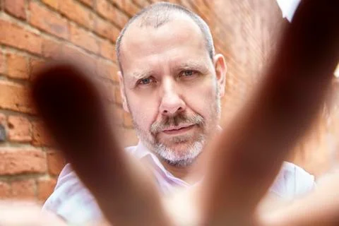 Through the fingers Stock Photos