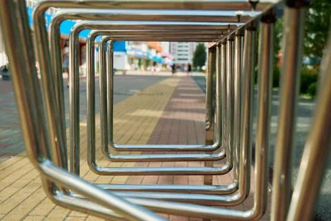 Through the Frame Perspective View of Metal Bike Rack on Urban Pedestrian All Stock Photos