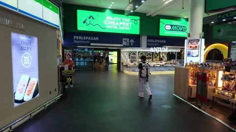 Through gateway klia2 terminal concourse towards the Departures area. Stock Footage 340939557